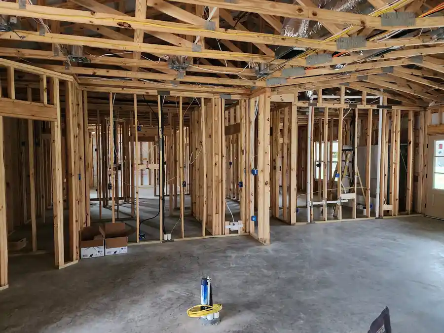 New construction rough-in: open stud walls with boxes set and wire pulled