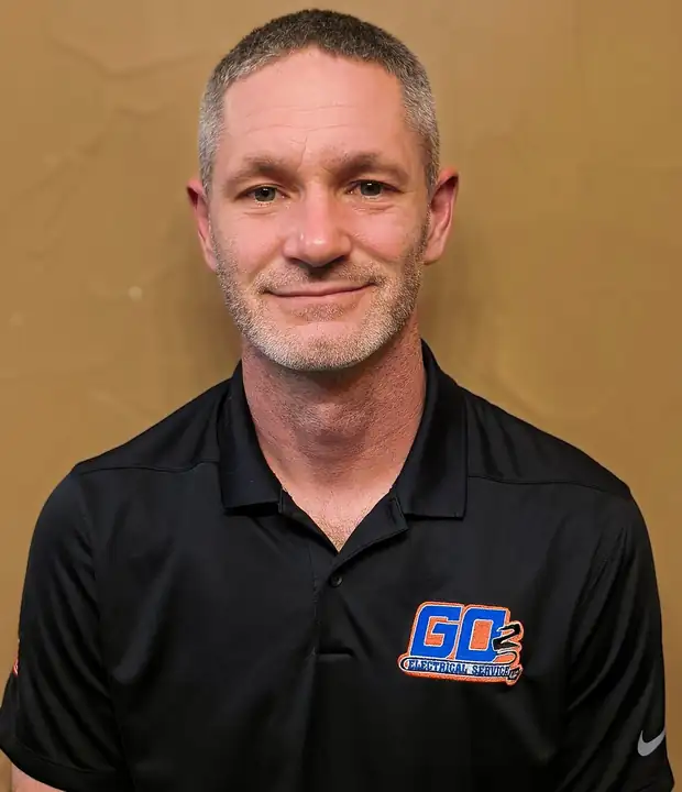 Justin Zimmerman, owner and master electrician, in a black GO 2 Electrical Service polo