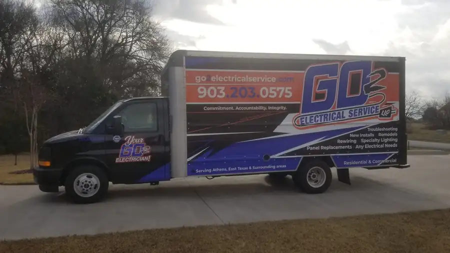 The GO 2 Electrical Service box truck in blue, black and orange livery